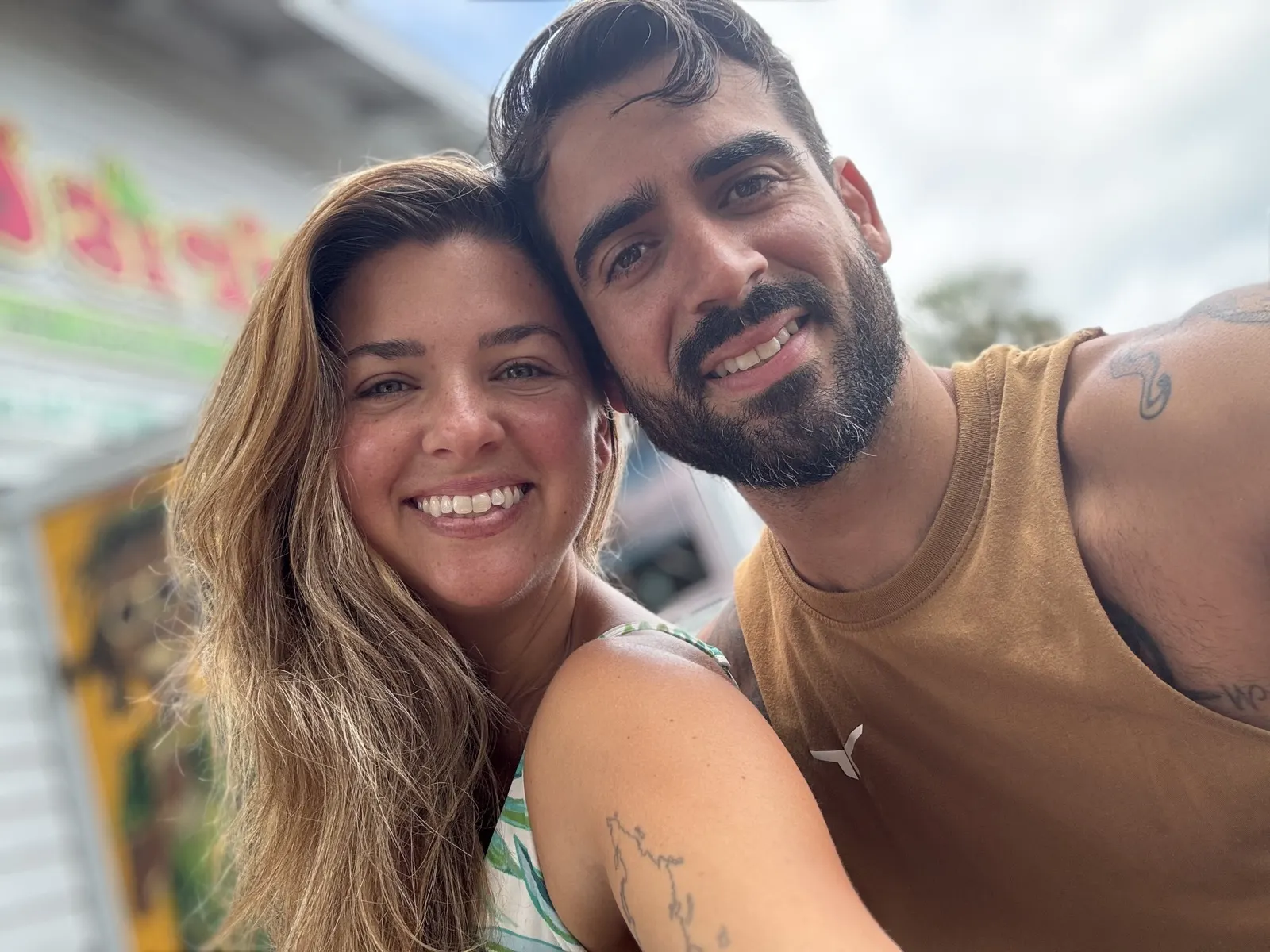 Carlos and Hannah Lopez smiling together