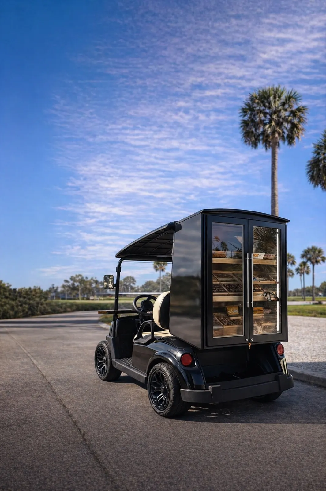 Patent-pending Fire and Ash cigar golf cart parked at dusk
