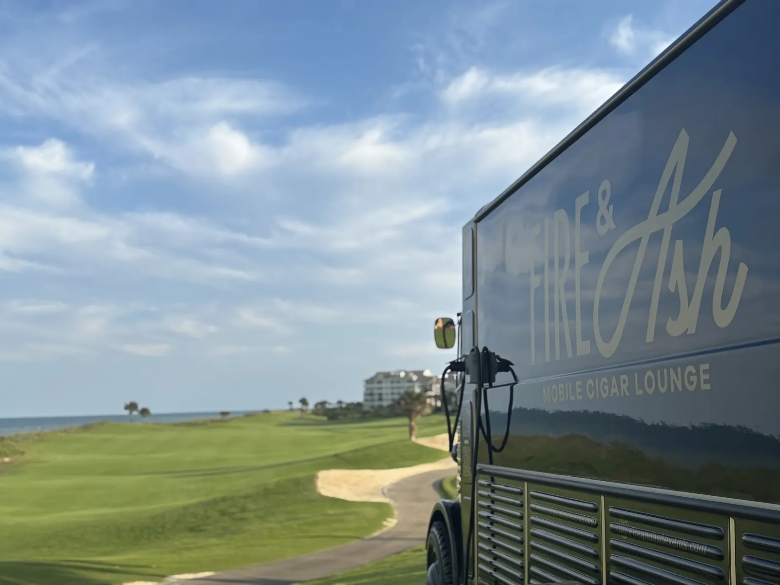 Fire and Ash trailer parked on a golf course