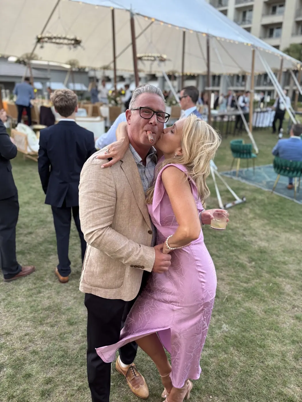 Couple kissing at a Fire and Ash tent event